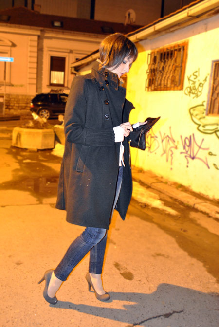 black coat, gray heels, white shirt